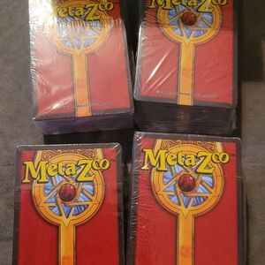 MetaZoo Red and Yellow Card Decks 4 Unopened Packs NEW Meta Zoo